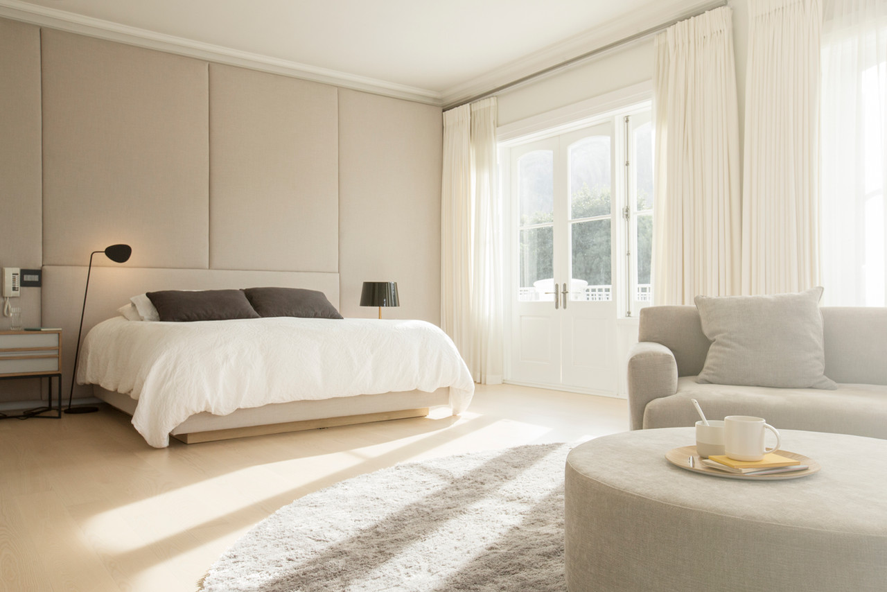 Low-traffic spots — under furniture, behind appliances, top edges — are where dust quietly accumulates between visits.